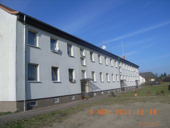 Immobilienverkauf-Königsberg-12-WE-Block-Ansicht-hinten-mit Haustür-Eingängen